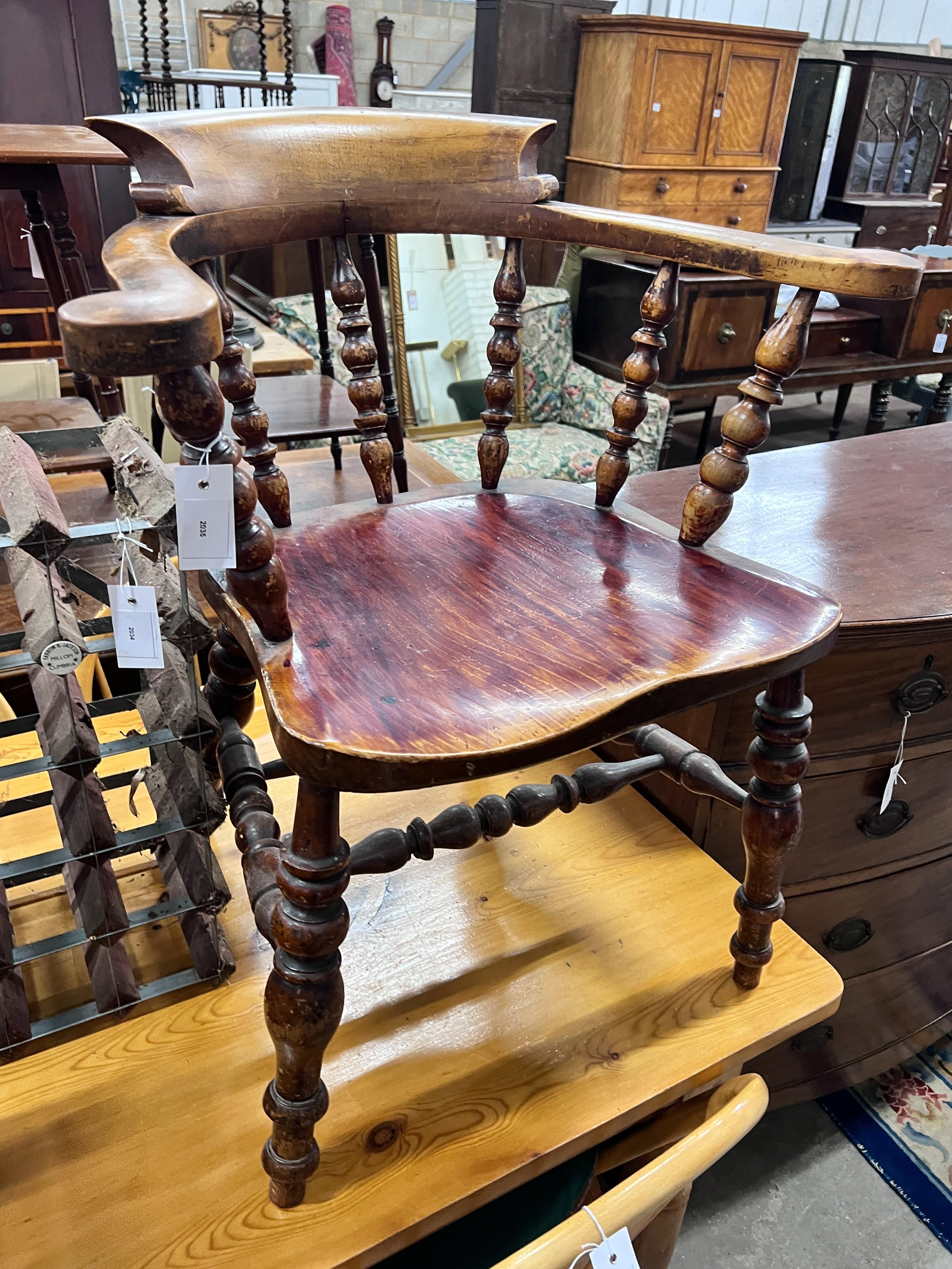 A Victorian elm and beech smoker's bow chair, width 67cm, depth 46cm, height 78cm